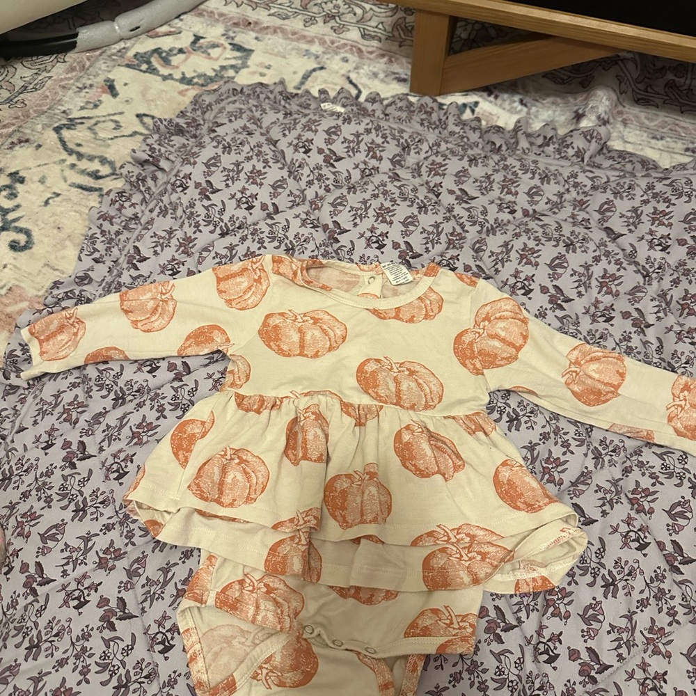 Kate Quinn skirted bodysuit